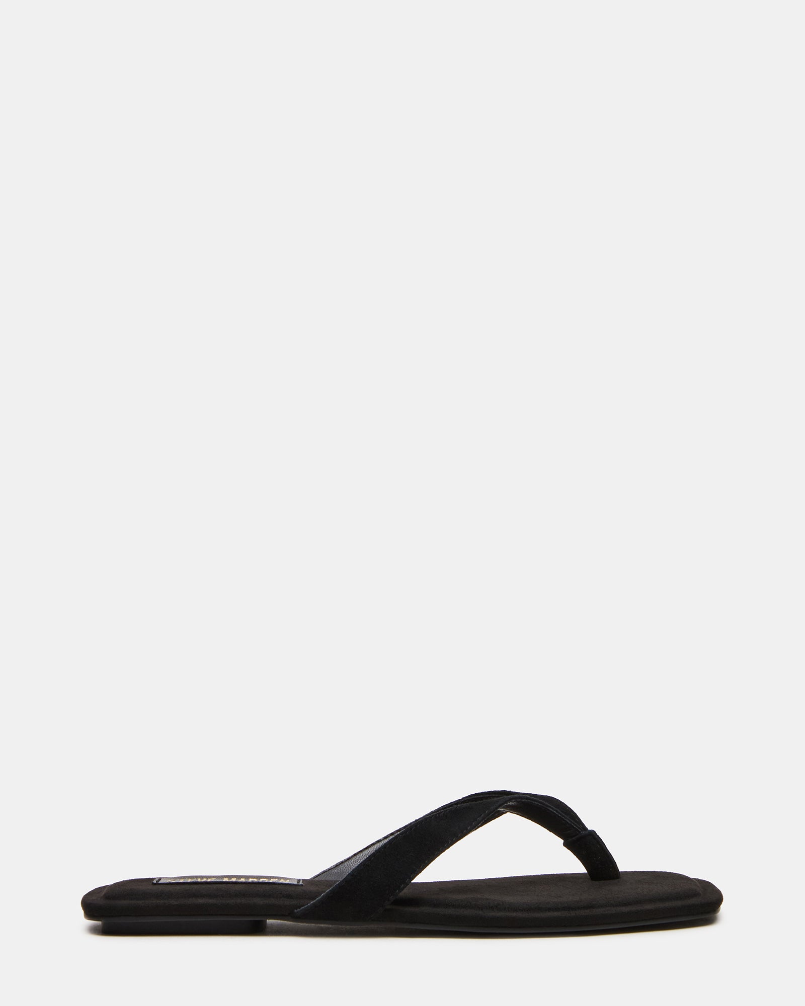 Side view of black suede sandals showing square toe and sleek strap