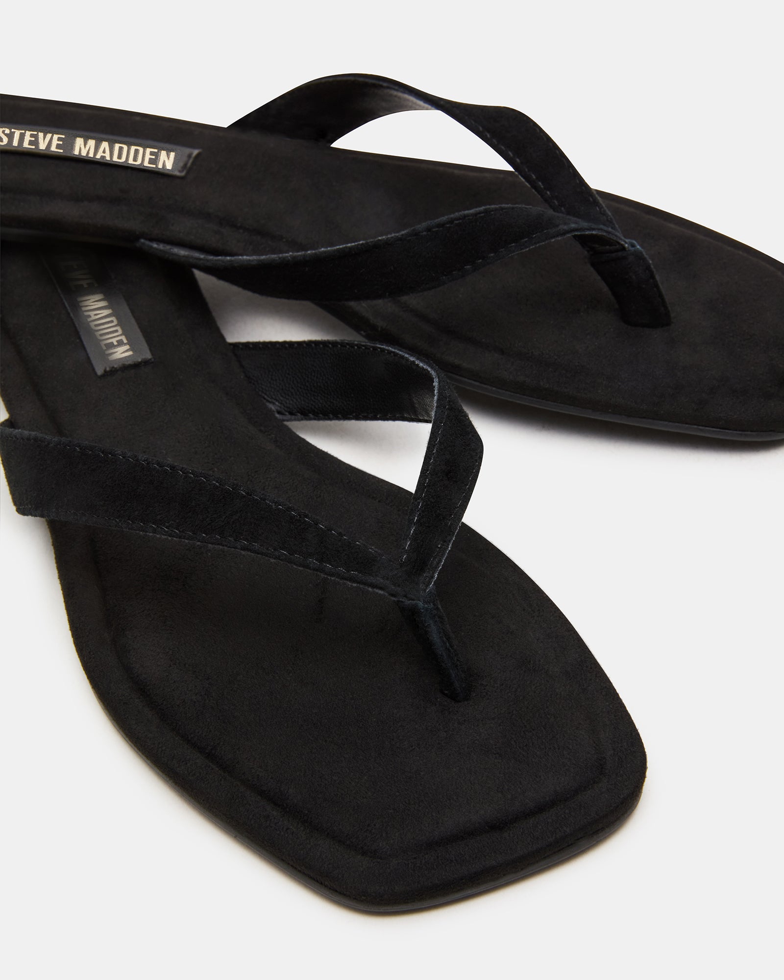 Close-up of suede texture and heel height for comfort-focused design